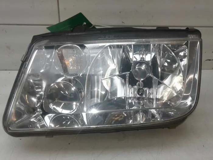 Headlight, left Volkswagen Bora