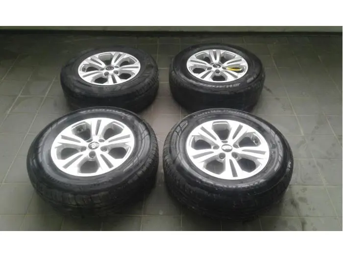 Set of wheels + tyres Kia Sportage