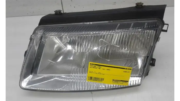 Headlight, left Volkswagen Passat