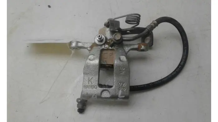 Rear brake calliper, left Kia Rio
