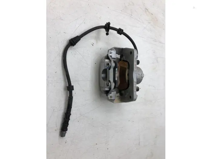 Front brake calliper, left Opel Combo