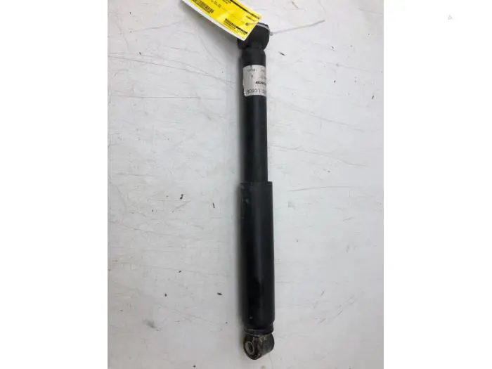 Rear shock absorber, left Nissan NT400