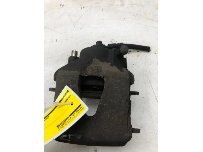 Front brake calliper, left Volkswagen Caddy