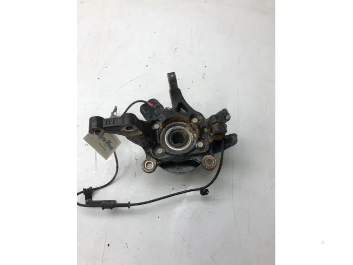 Knuckle, front right Kia Carens
