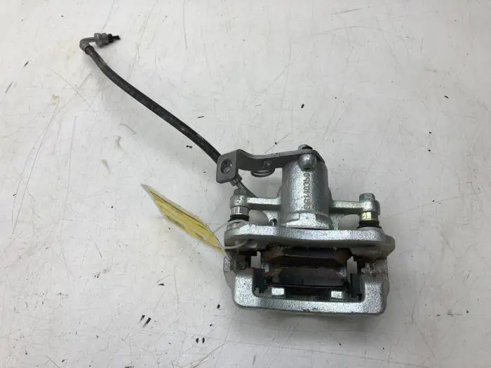 Rear brake calliper, left Kia Stonic