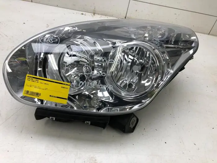 Headlight, left Fiat Doblo