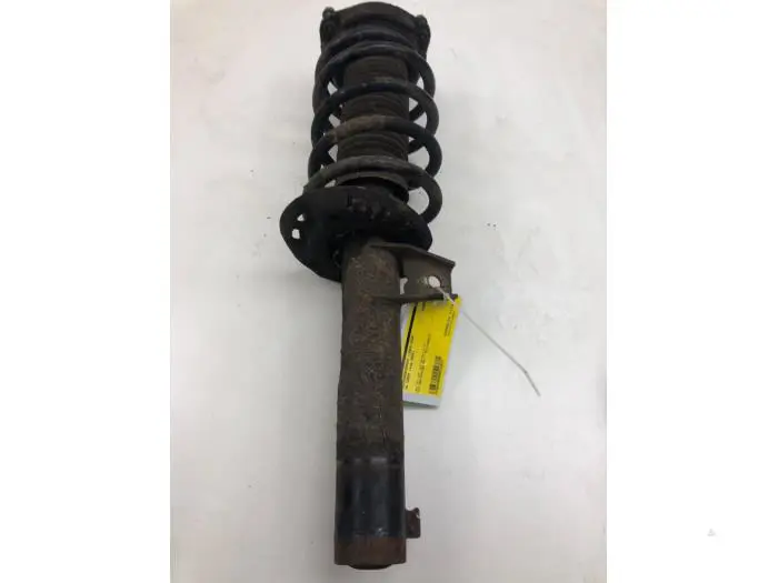 Front shock absorber rod, left Volkswagen Caddy