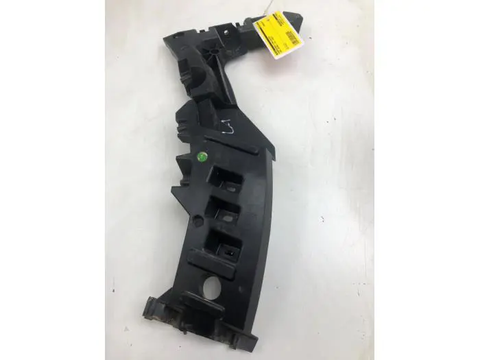 Rear bumper bracket, left Opel Astra