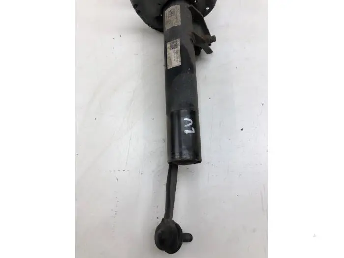 Front shock absorber rod, left Skoda Octavia