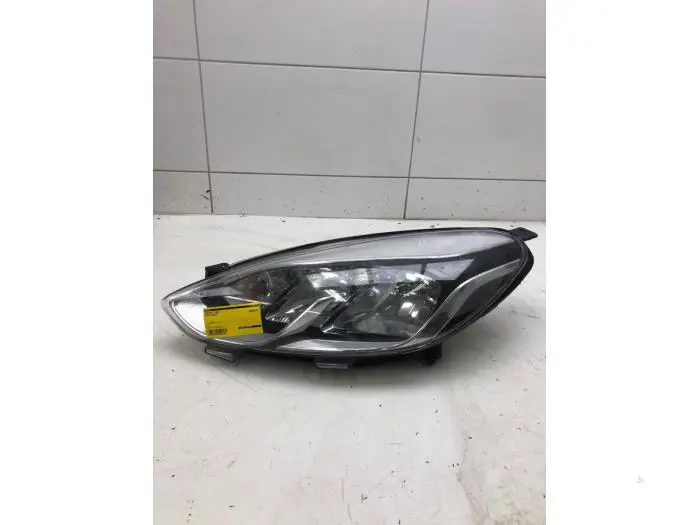 Headlight, left Ford Fiesta