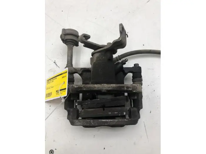 Rear brake calliper, left Opel Astra