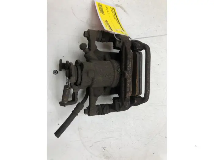 Rear brake calliper, left Opel Mokka