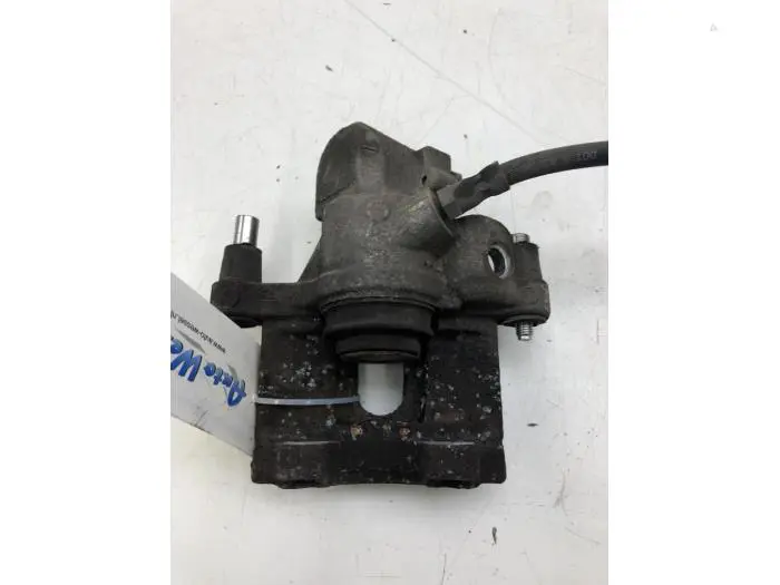 Rear brake calliper, left Volvo V40