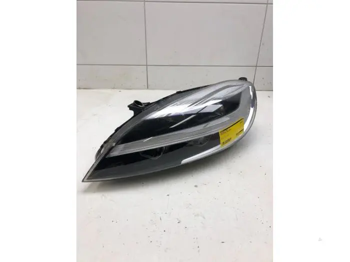 Headlight, left Volvo V40