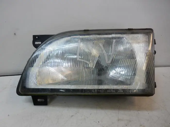 Headlight, left Ford Transit