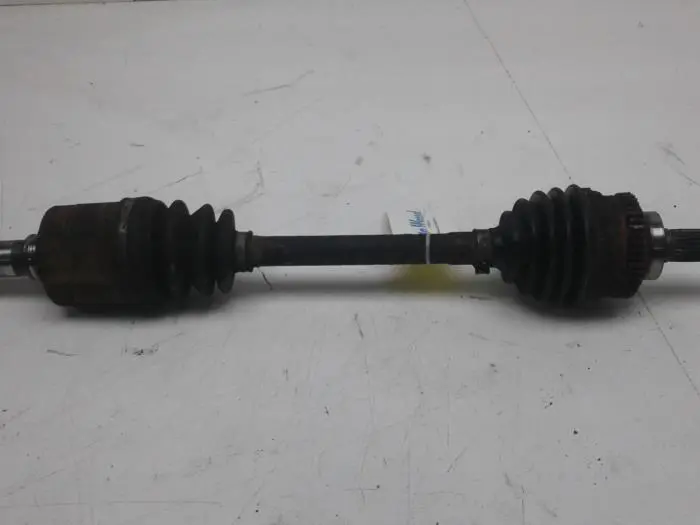 Front drive shaft, left Kia Rio